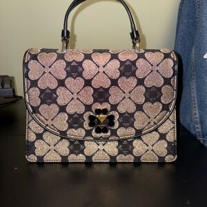 Elegant Black and Gold Handbag